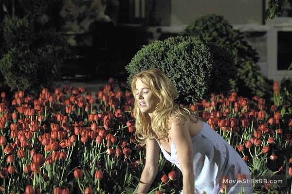 Film still: Generosa Ammon in the Hamptons garden — Million Dollar Murder (2005)